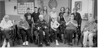 North Border sixth-graders and PNC residents pose for a group photo during their final visit of the school year May 13. Submitted photo