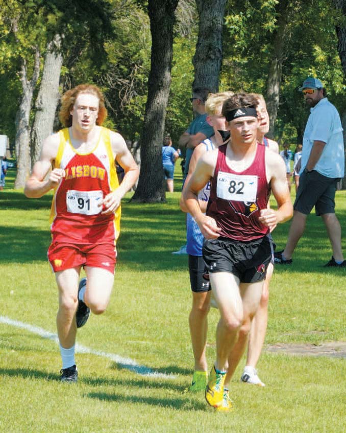 Brock Freer (#82) finished in 2nd place for the Cards at the Hillsboro-Central Valley Meet. Photo by Larry Stokke.