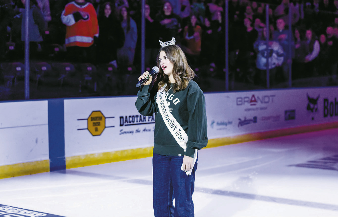 Audrey Emerson singing the National Anthem at a recent hockey game