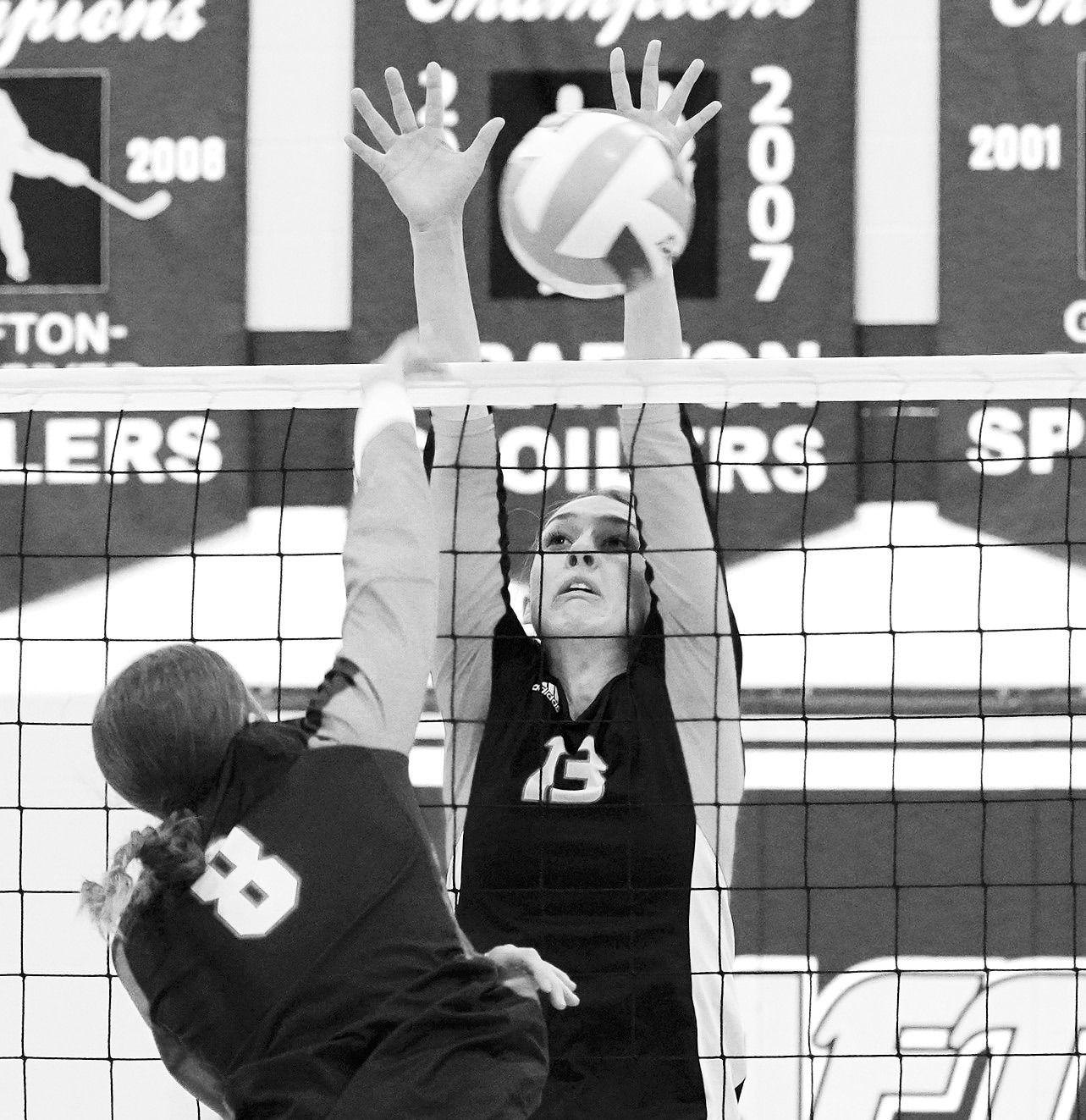 Ariana Thibeau stuff blocks Mayport C-G’s Abigail Anderson. Photo by Larry Stokke.