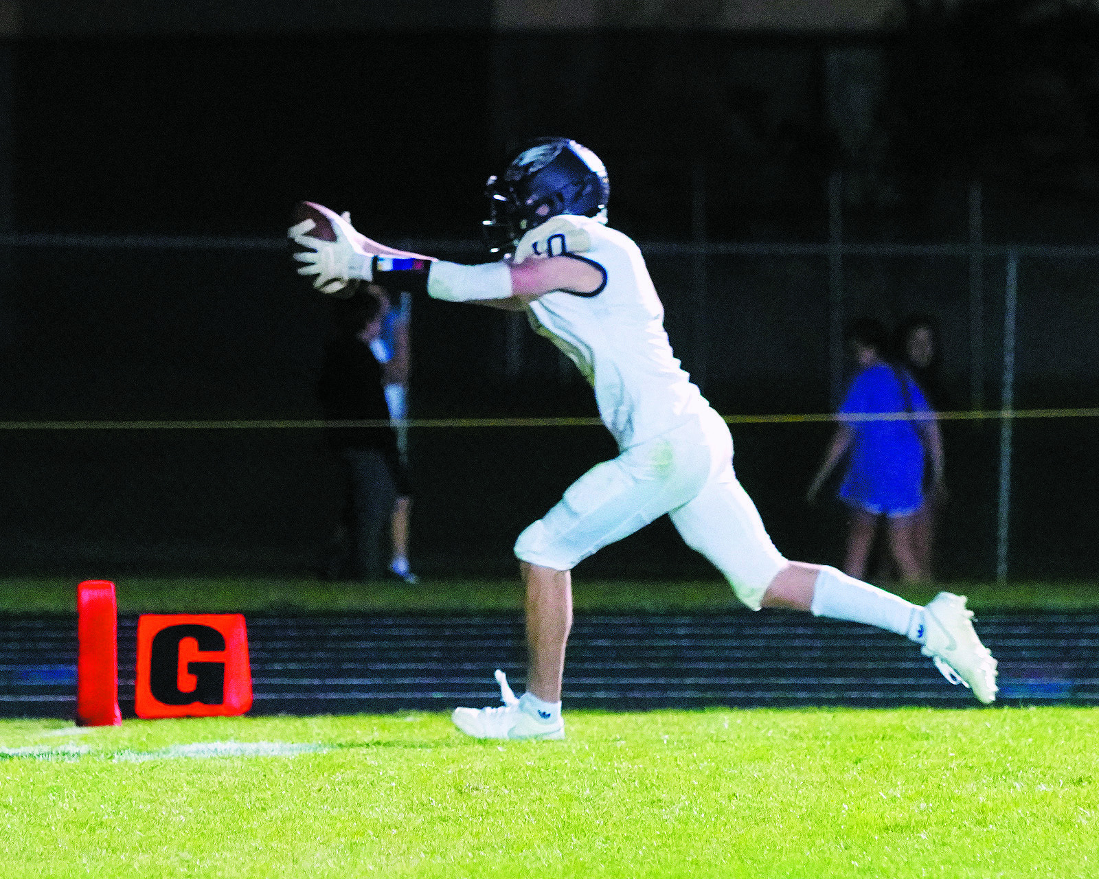 Kaden Moore runs in one of his two touchdowns in the Eagles win in St John on Sept. 27 over the Woodchucks. Photo by Larry Stokke.