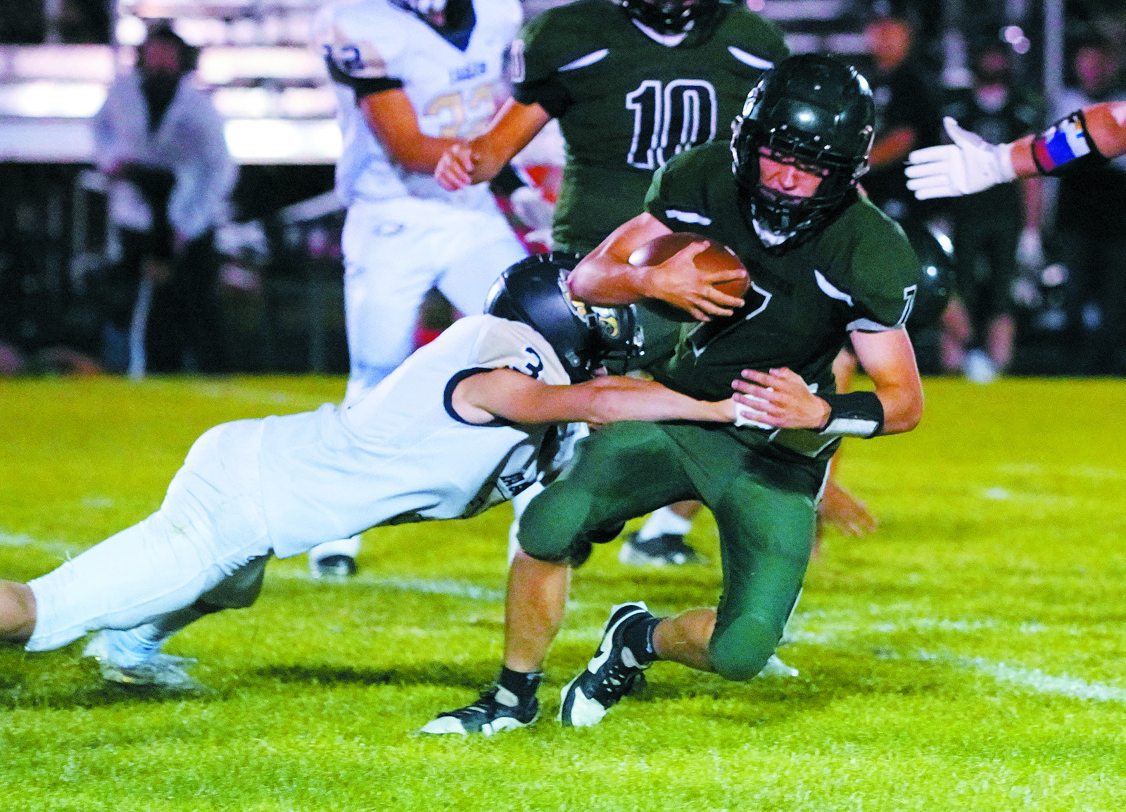 Oakley Brown sacks the Woodchucks quarterback. Photo by Larry Stokke.