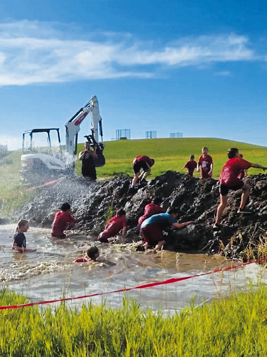 Youth racers brave the mud pits at the Medieval Rush in early August 2025. Photo provided by Tanner Schweitzer.