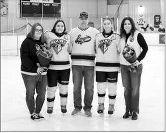 Senior Day was Feb 21. L-R Heather Horpestad, Kenadee Cluchie, Shawn Regner, McKenzie Regner, Julie Regner. Photo by Larry Stokke
