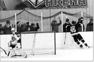 Ty Ramberg celebrates one of his three goals for a hat trick in the 5-3 win over Northwood. Photo by Larry Stokke