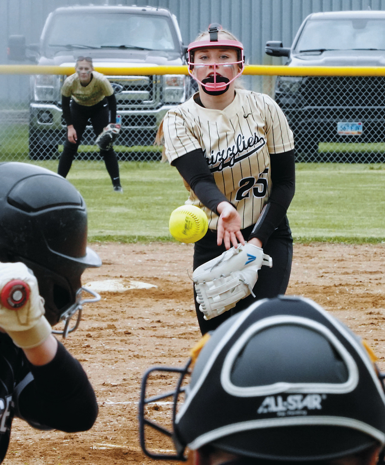 Sara Jensen delivers a strike to a Nelson County player in Cavalier on May 18. Photo by Larry Stokke.