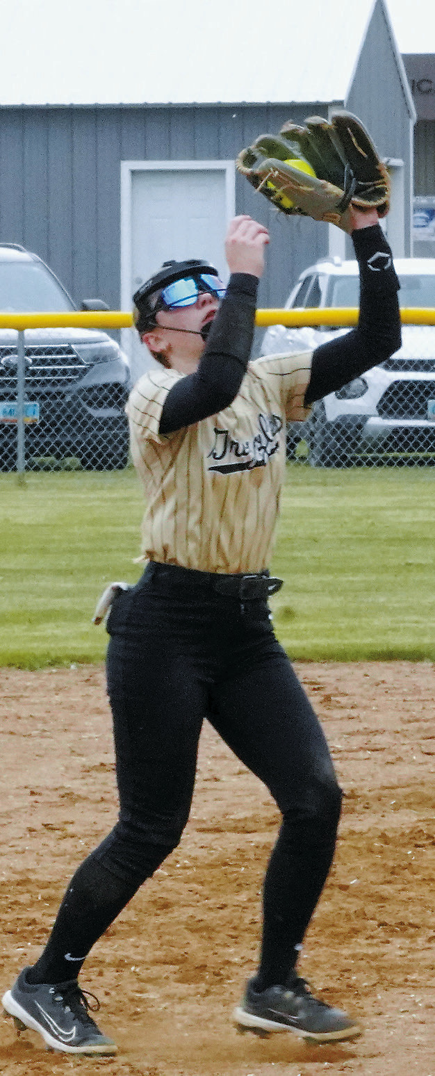 Remi Larson catches a pop fly for a third out against Nelson County. Photo by Larry Stokke.