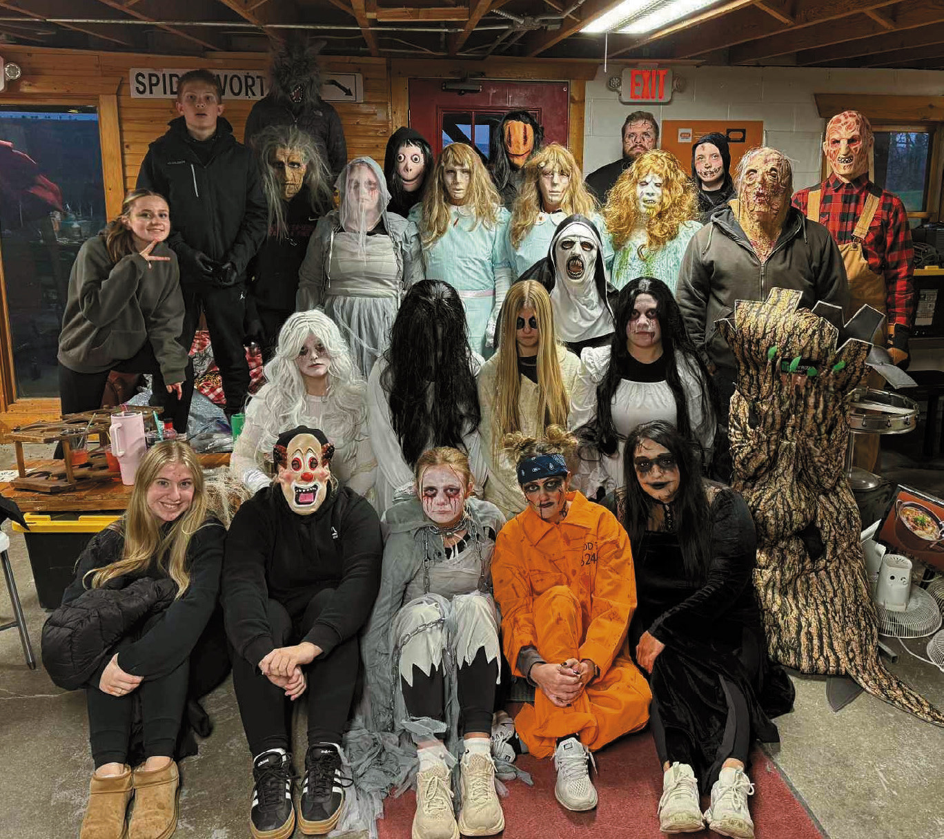 The team of ‘scarers’ who helped make the haunted house fundraiser a frightening success.