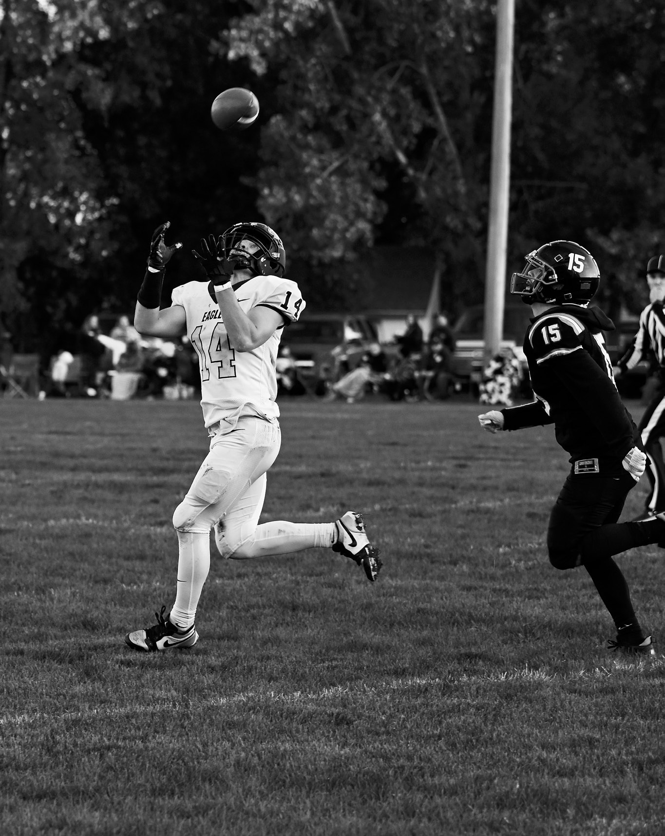 Colton Bailly pulls down the reception to keep the drive alive.