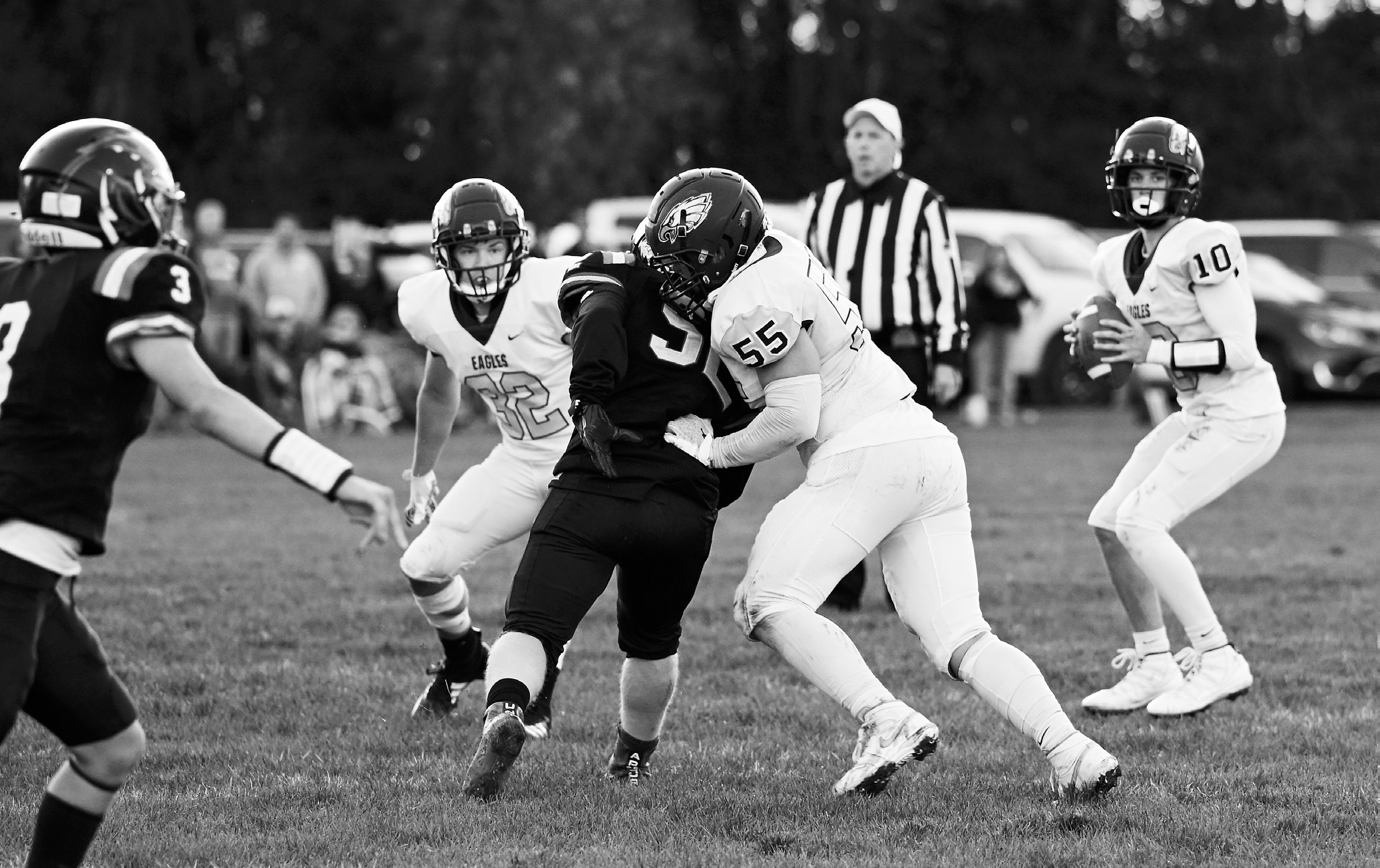 Gavin Symington's blocking gives Kaden Moore the moment he needs to pass.
