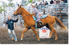 Young rider prepares to enter the arena during a youth event at Wojo’s Rodeo in Hamilton. Competitors of all ages took part in the two-night rodeo held June 12-13. Photo by Larry Stokke