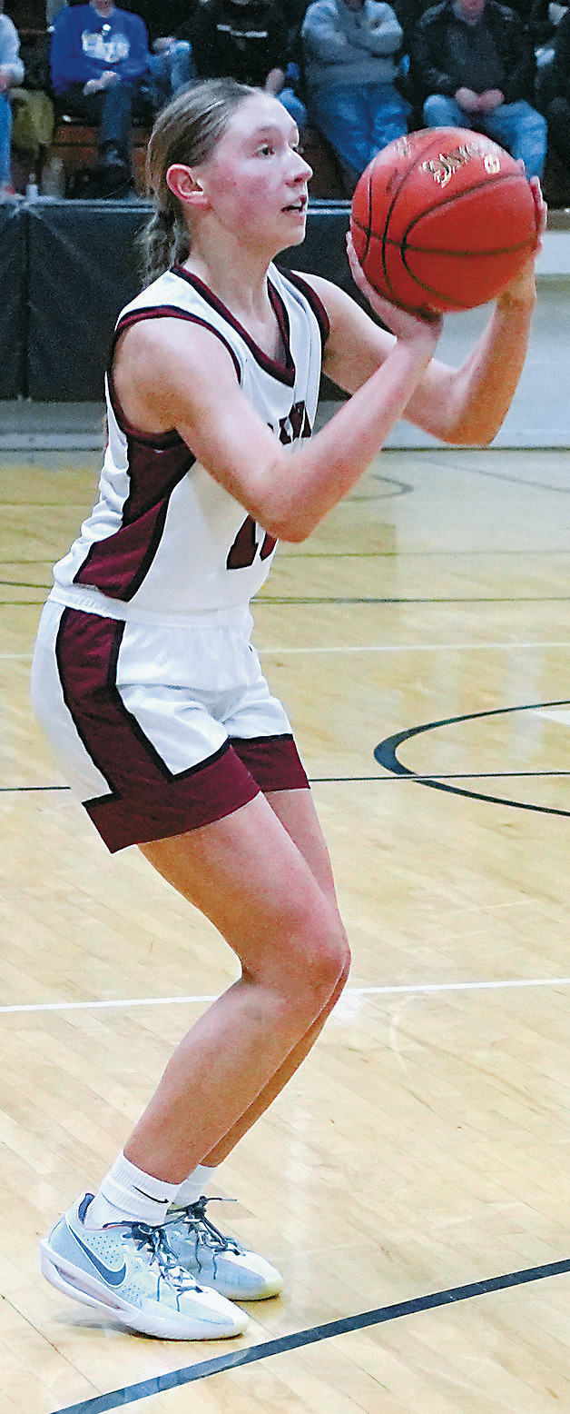 Aubrey Badding dropped in two three point baskets to add 16 points to the Cards’ 54 points for the game. Photo by Larry Stokke.