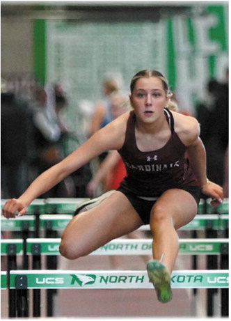 Performer of the Meet for the girls, Meggy Hetletved. She had a personal best time in the 60 hurdles and placed fourth. Photo by Larry Stokke