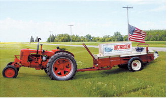 A vintage Case tractor and McCormick threshing machine welcome visitors to the Cavalier County Historical Society Museum in Dresden during the ninth annual Picnic at the Museum and Threshing Event on July 19. Photo by Larry Stokke