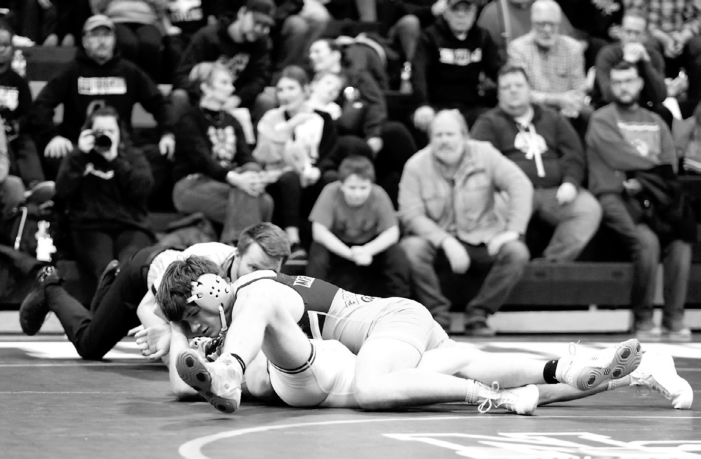 Oscar Martinez won his match with a pin over his Hillsboro-Central-Valley opponent. Photo by Larry Stokke.