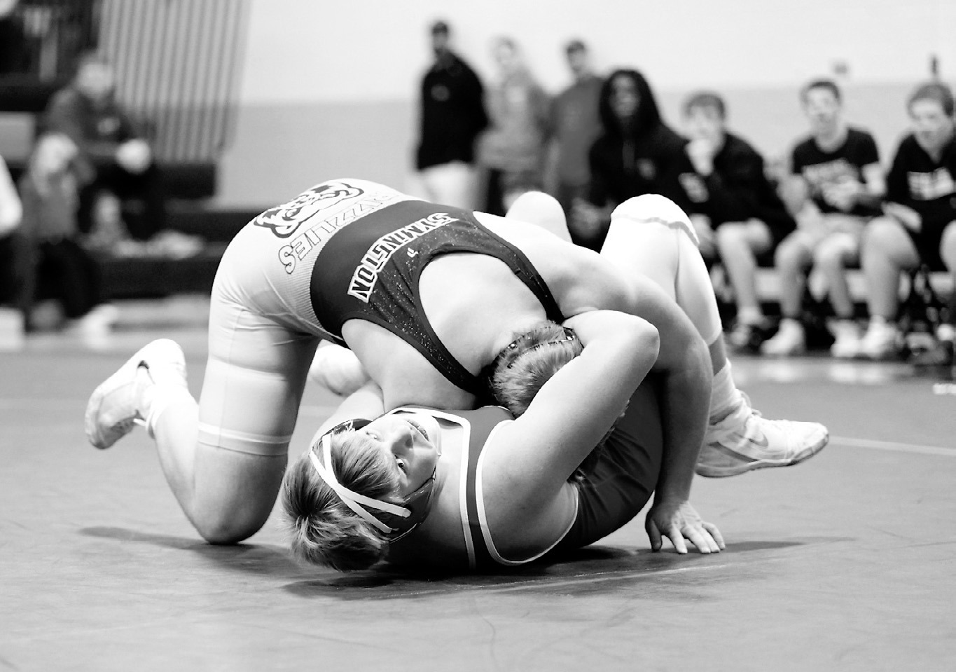 Gavin Symington in the 215-pound weight class won by pinning his opponent. Photo by Larry Stokke.