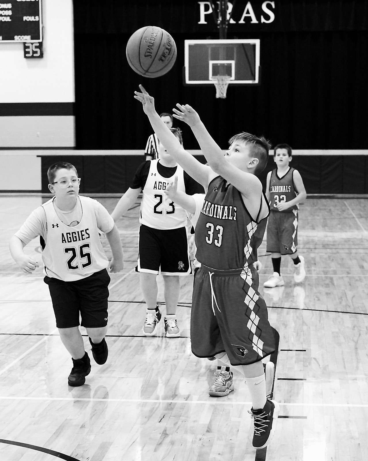 Xander Salazar puts up a shot in Park River in the Cards game against the Aggies on Nov. 6. Photo by Larry Stokke.