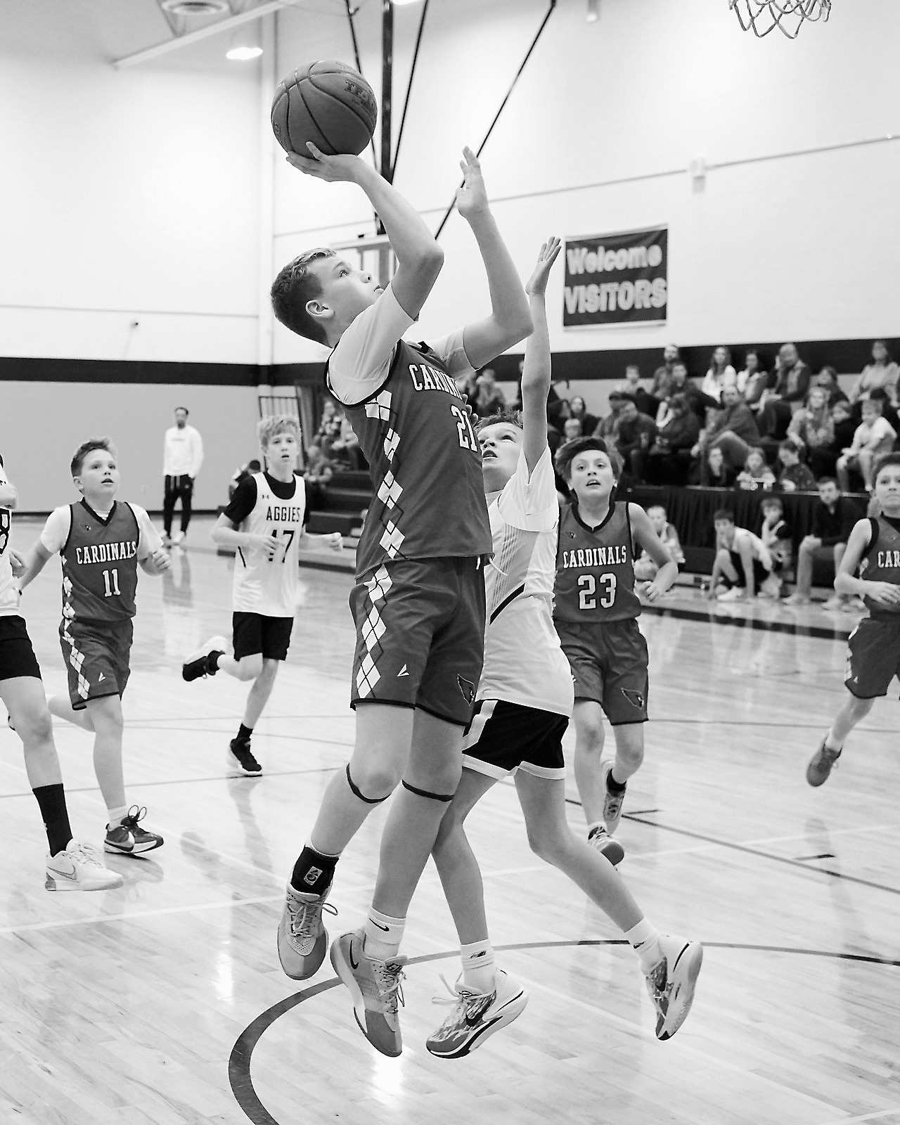 Oakley Koons adds two points to the Cards' winning score over the Aggies in Park River on Nov. 6. Photo by Larry Stokke.