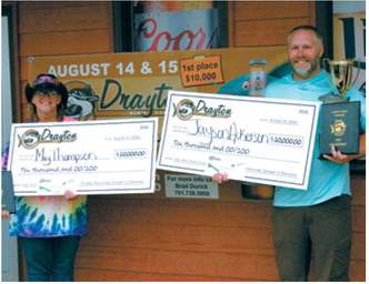 May Thompson and Jayson Ackerson took first place in Drayton’s Catfish Capital Challenge with a two-day total of 76.68 pounds. Photo courtesy of Drayton Community Chamber of Commerce