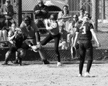 Jada Moen gets a walk after getting nailed in the foot against Nelson County. Photo by Larry Stokke.