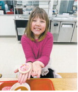 A Pembina student celebrates with a sprinkled cookie. Submitted photo