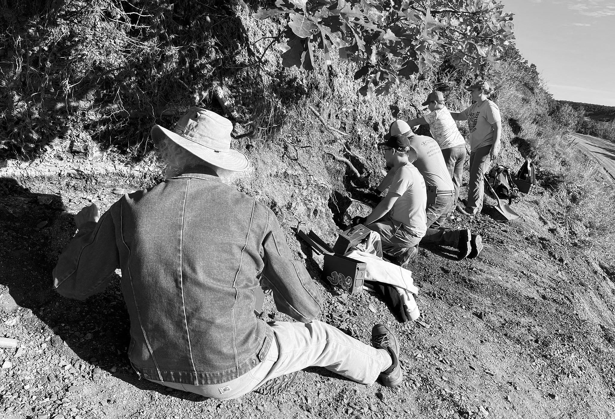 From left to right: Ron Ellingson, Brayden Geir, Ryan Jose, Gavin Olson, Casey Olson - working the high wall above the Pembina Gorge. Photo courtesy of N.D. Geological Survey.