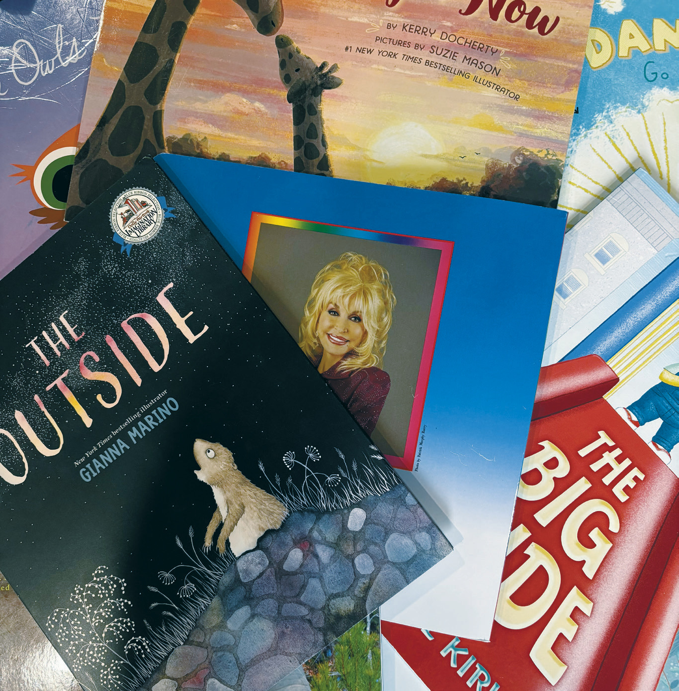 Dolly Parton smiles from the back cover of one of the many books distributed through her Imagination Library, a program that has benefited children throughout Cavalier County. Photo by Sarah Overby