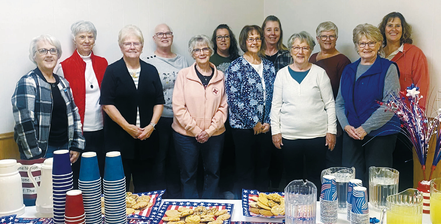 The Friendship Star Quilting Guild (L-R) Gael Balsdon, Karen Bimler, Linda Olson, Heidi Veit , Joanne Fewell, Mindy Balsdon, Karen Boe, Barb Boesl, Elaine Haugen, Carol Girodat, PJ Rime, and Darby Hart. Not photographed: Linda Timian, Denise Ratzlaff, Peggy Davis, JoAnn Mueller, Janelle Bata, Sue Anderson, Ann Thompson, and Pam Luhmann.