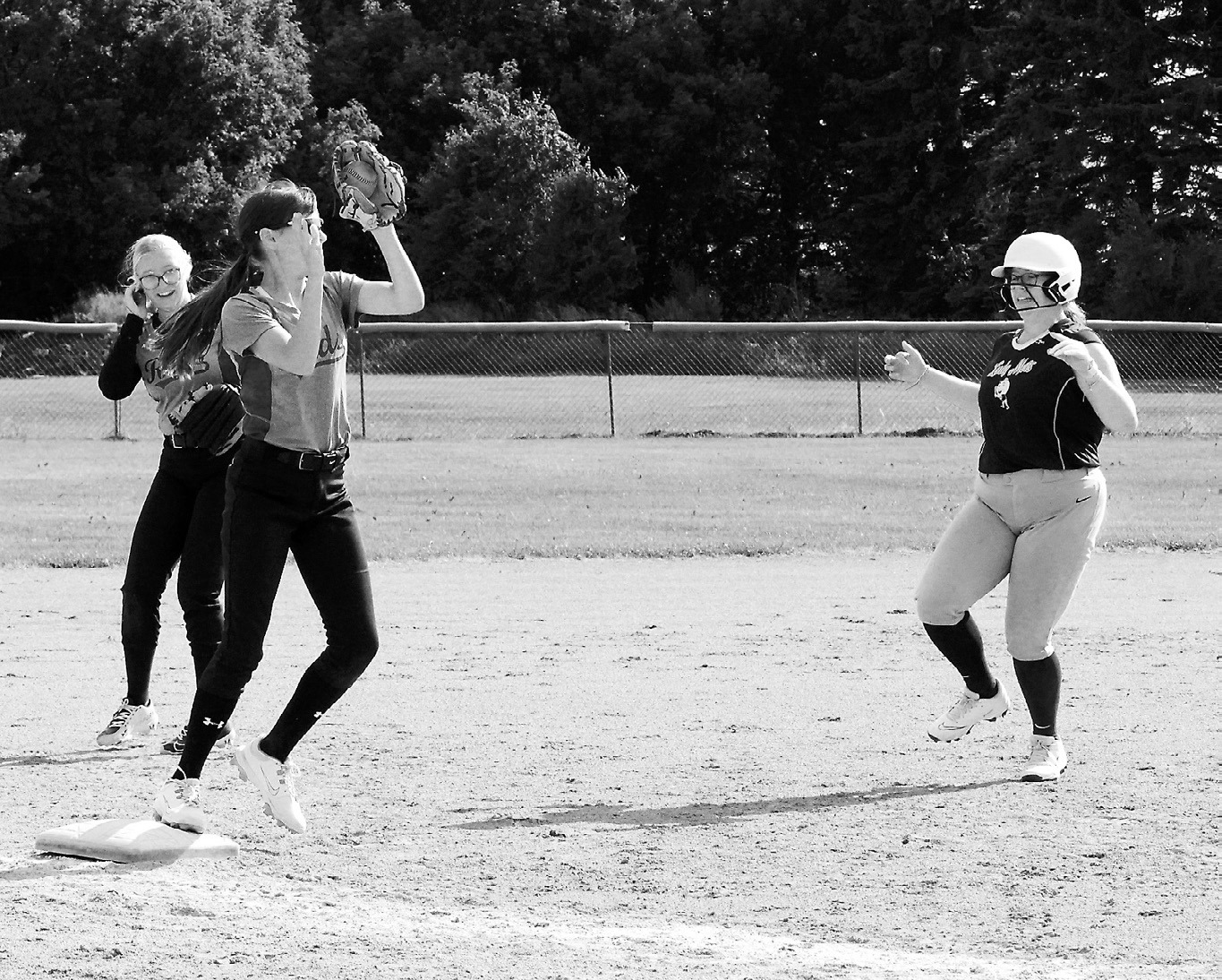 Lily Zimmer puts out a Valley runner at third base in Crystal on June 23. Photo by Larry Stokke.