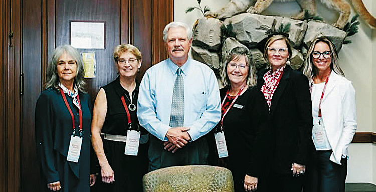 From (L-R) Mary Ellen Kirking, Linda Thorson, Senator John Hoeven, Karen Anderson, Sandy Sanford, and Jennifer Benson at the CWA summit.