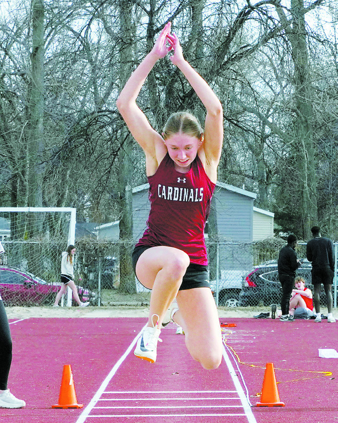 Aubrey Badding triple jumped a distance of 34' 1/4' to place 2nd and qualify for state. Photo by Larry Stokke.