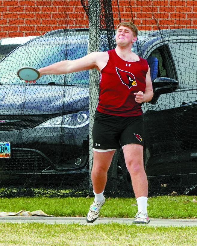 Reed Scherr placed 7th in the discus with a throw of 117' 1'. Photo by Larry Stokke.