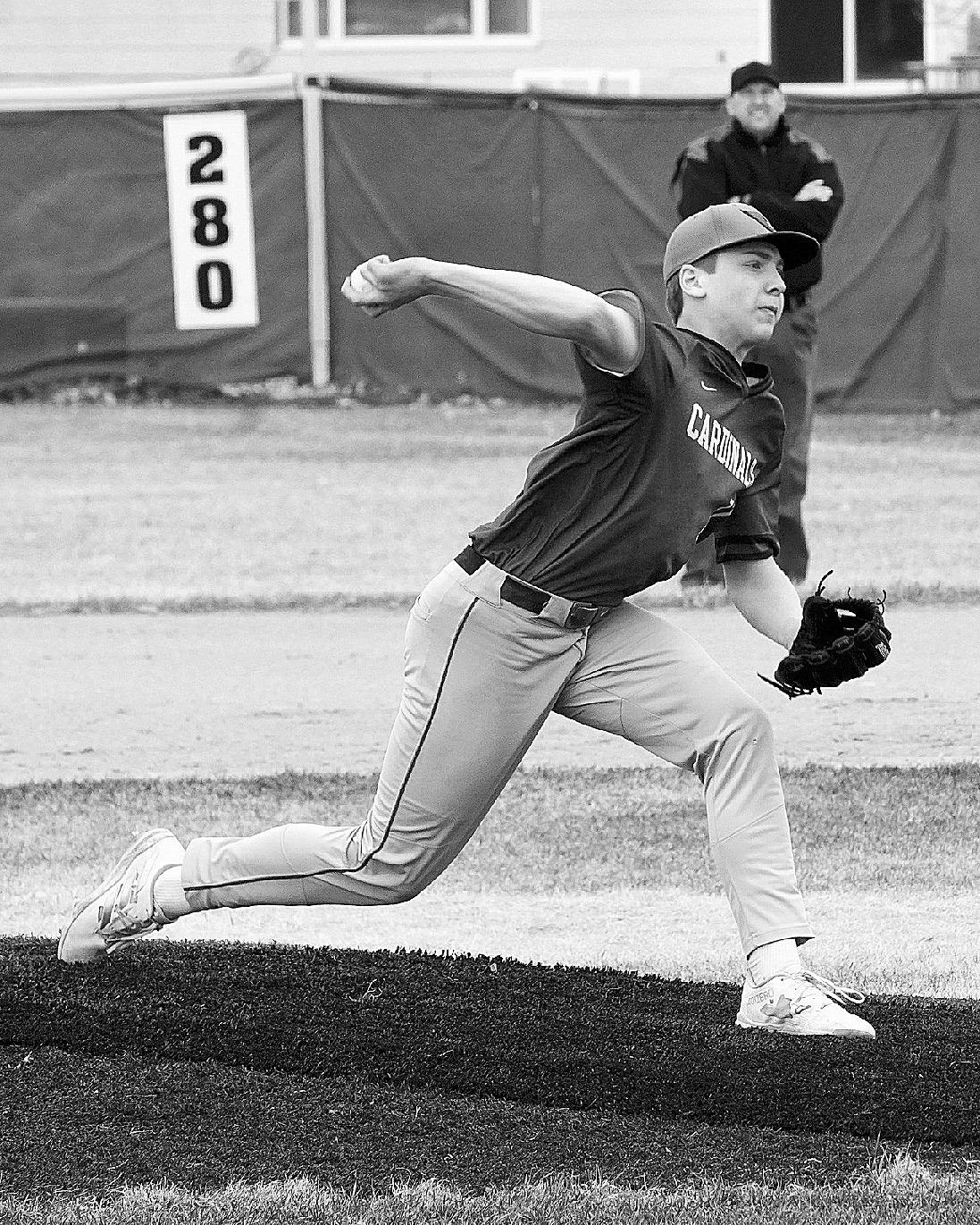 Jax Johnson winds up and hurls a strike. Photo by Larry Stokke.