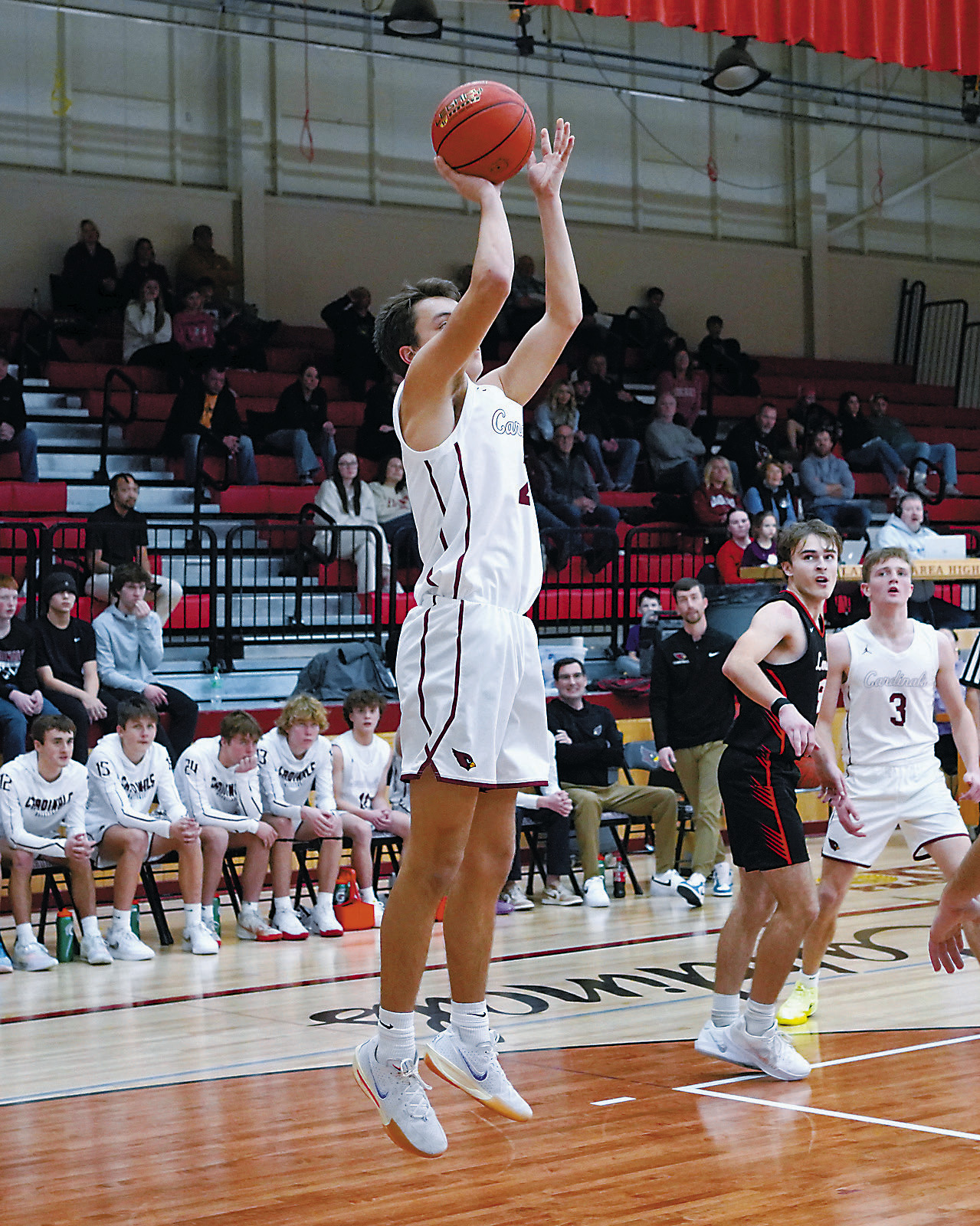 Tanner McDonald adds two points to the board in the game against Larimore. Photo by Larry Stokke.