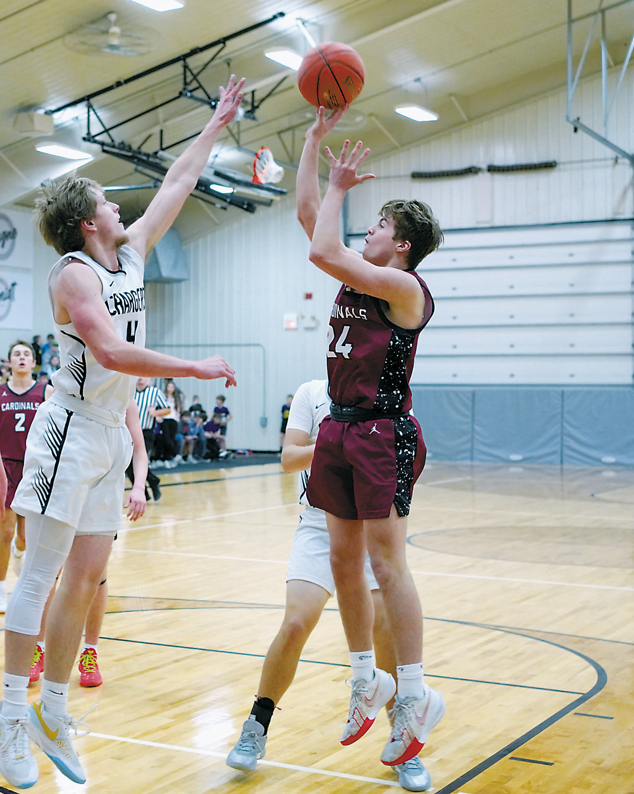 Dawson Downs puts up a shot over a Nelson County defender in Lakota Jan. 13. Photo by Larry Stokke.