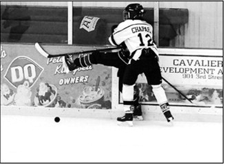 Aishwarya Chapara moves a Bottineau player out of her way and gains control of the puck. Photo by Larry Stokke