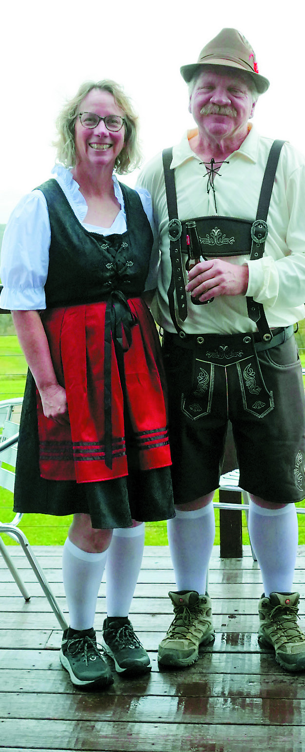 Greg and Deb Doshchke wearing their dirndl and lederhosen for Frost Fire's Oktoberfest. Photo by Larry Stokke.
