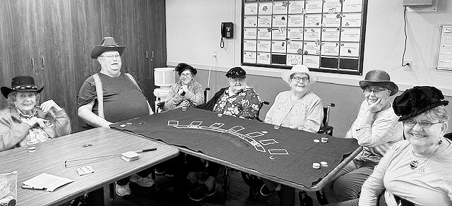 Residents playing blackjack on Hat Day.
