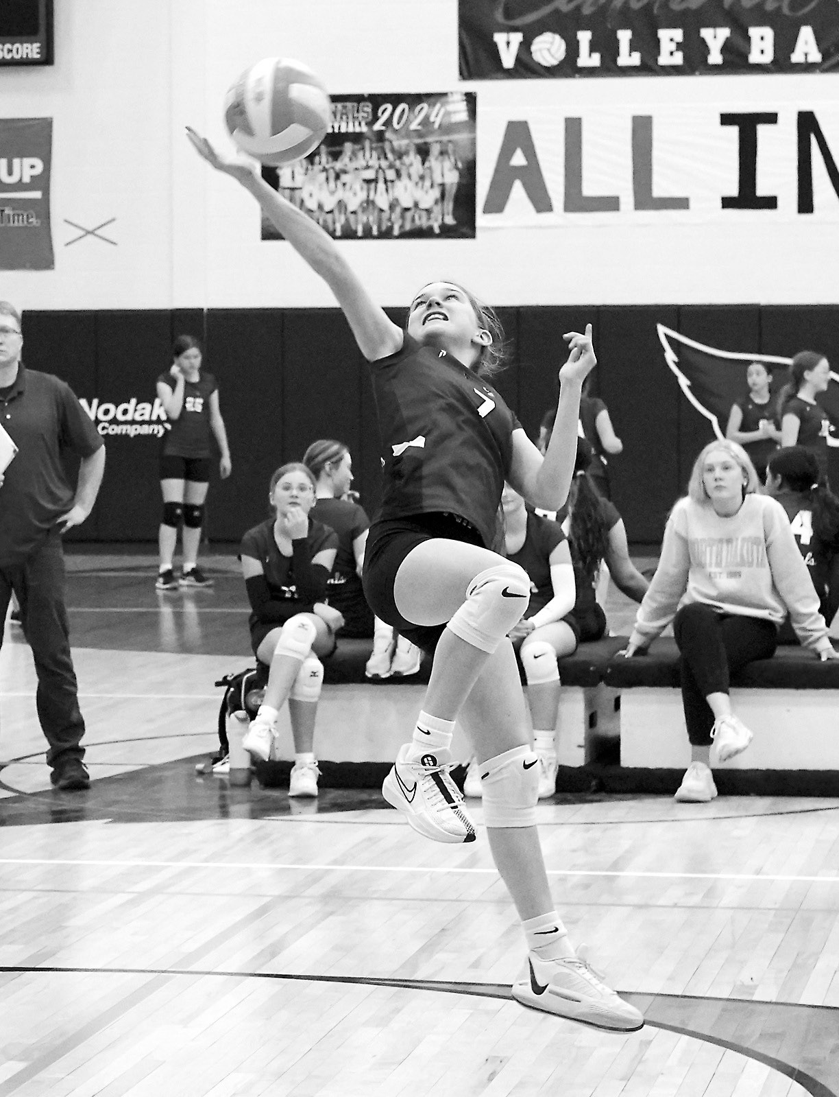 Sophia Longie reaches back for a great save. Photo by Larry Stokke.
