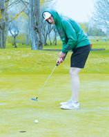 Cardinal golfer Reese Hoffarth shot a 76 to qualify him for the State Meet. Photo by Larry Stokke.