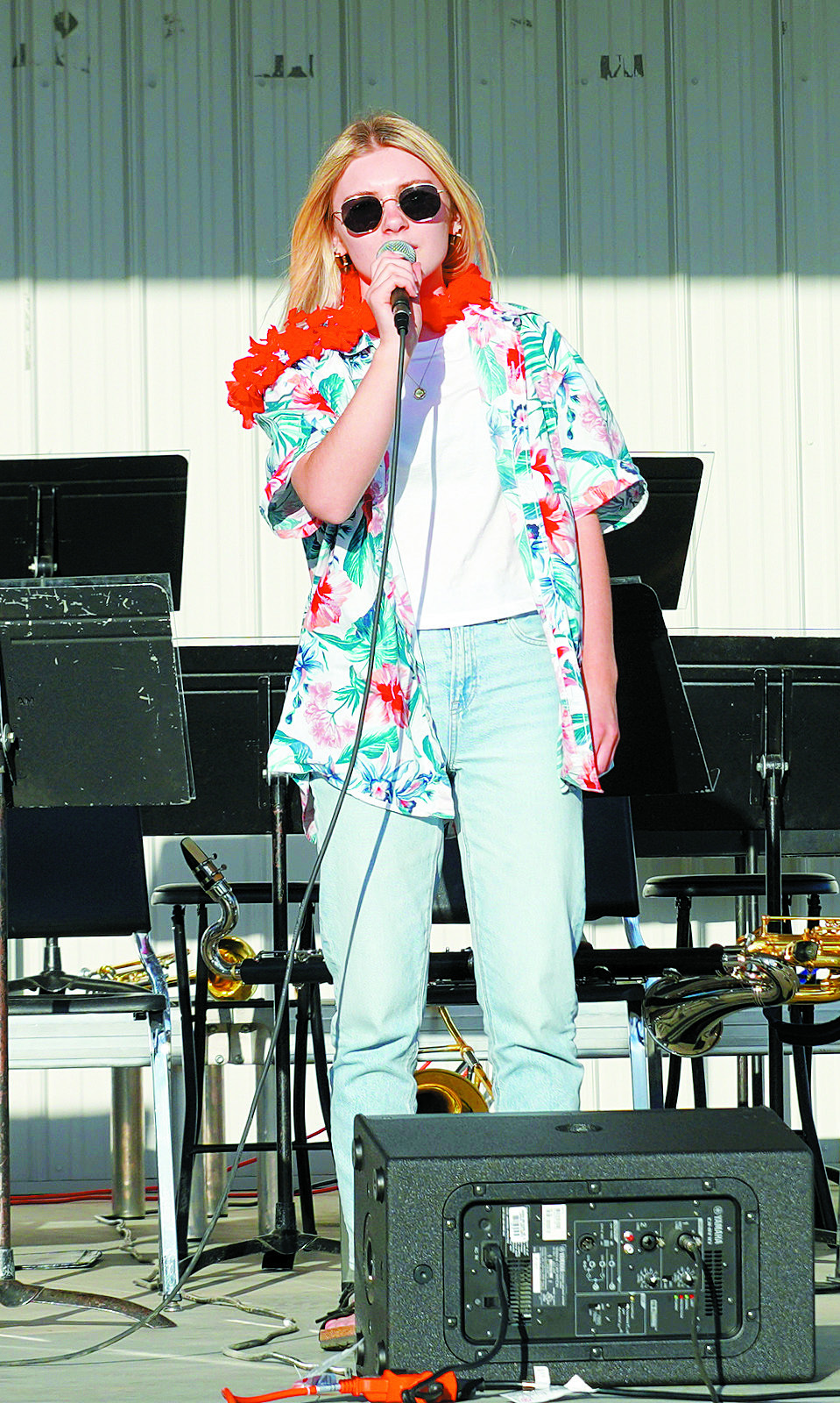 Caitlin Goodman singing in her summer attire. Photo by Larry Stokke.