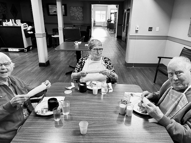 Doreen, Lorraine, and Howard enjoying their meal.