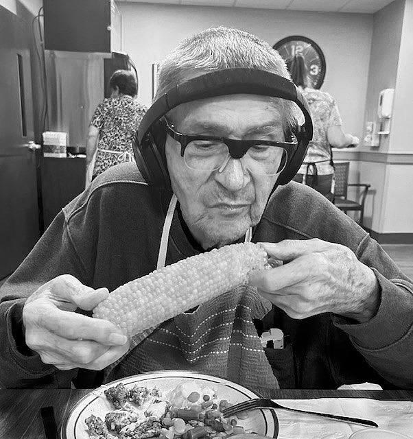 John enjoying his sweet treat.