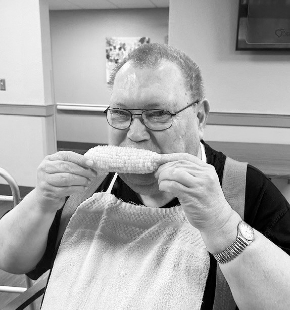 Richard chowing down on some corn on the