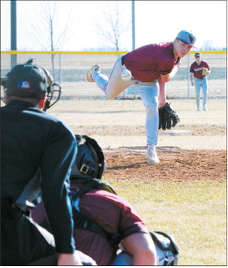 Jax Johnson sends a strike across the plate. He struck out seven Grafton batters in the Cards win. Photo by Larry Stokke