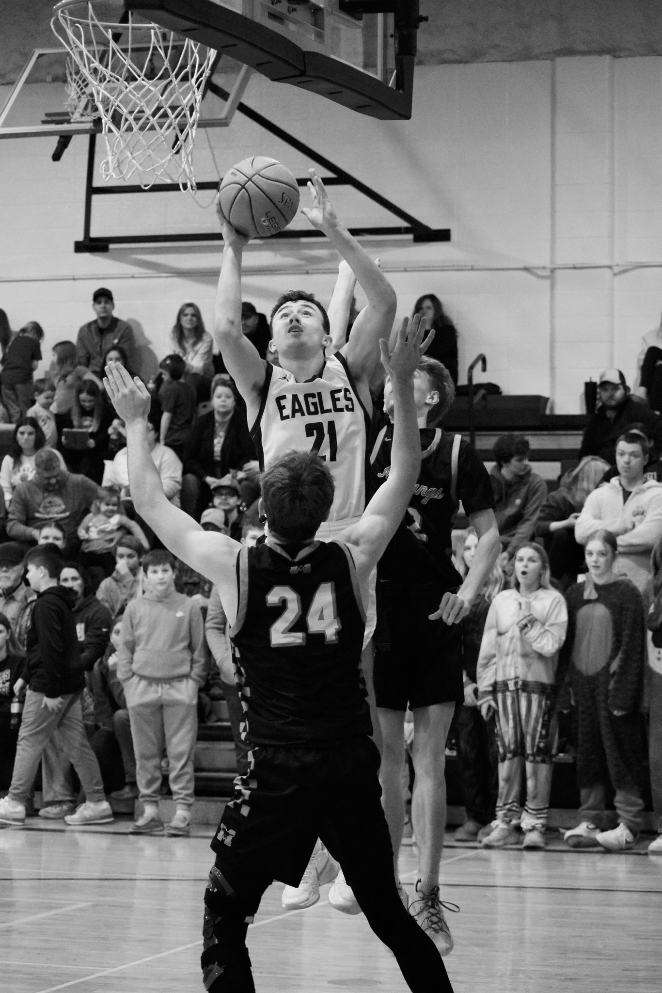 Brody Berg goes up for the shot during the game against the Mustangs on Jan. 21.