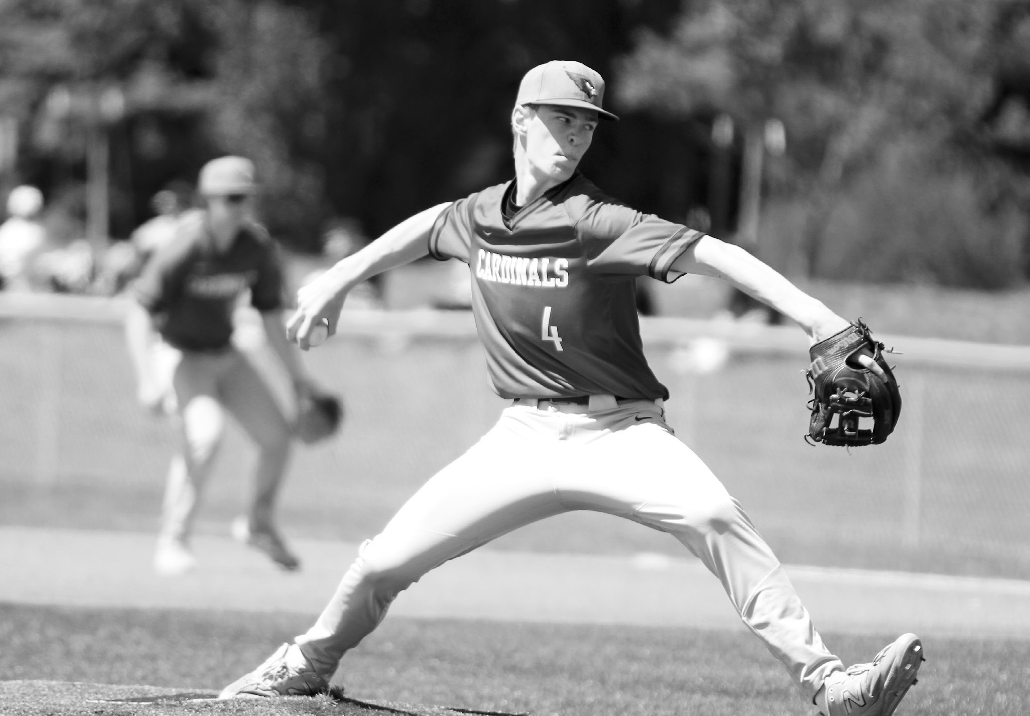 Tyson Gemmill winds up and sends a strike across the plate. Photo by Chelsea Wysocki/The Walsh County Record.