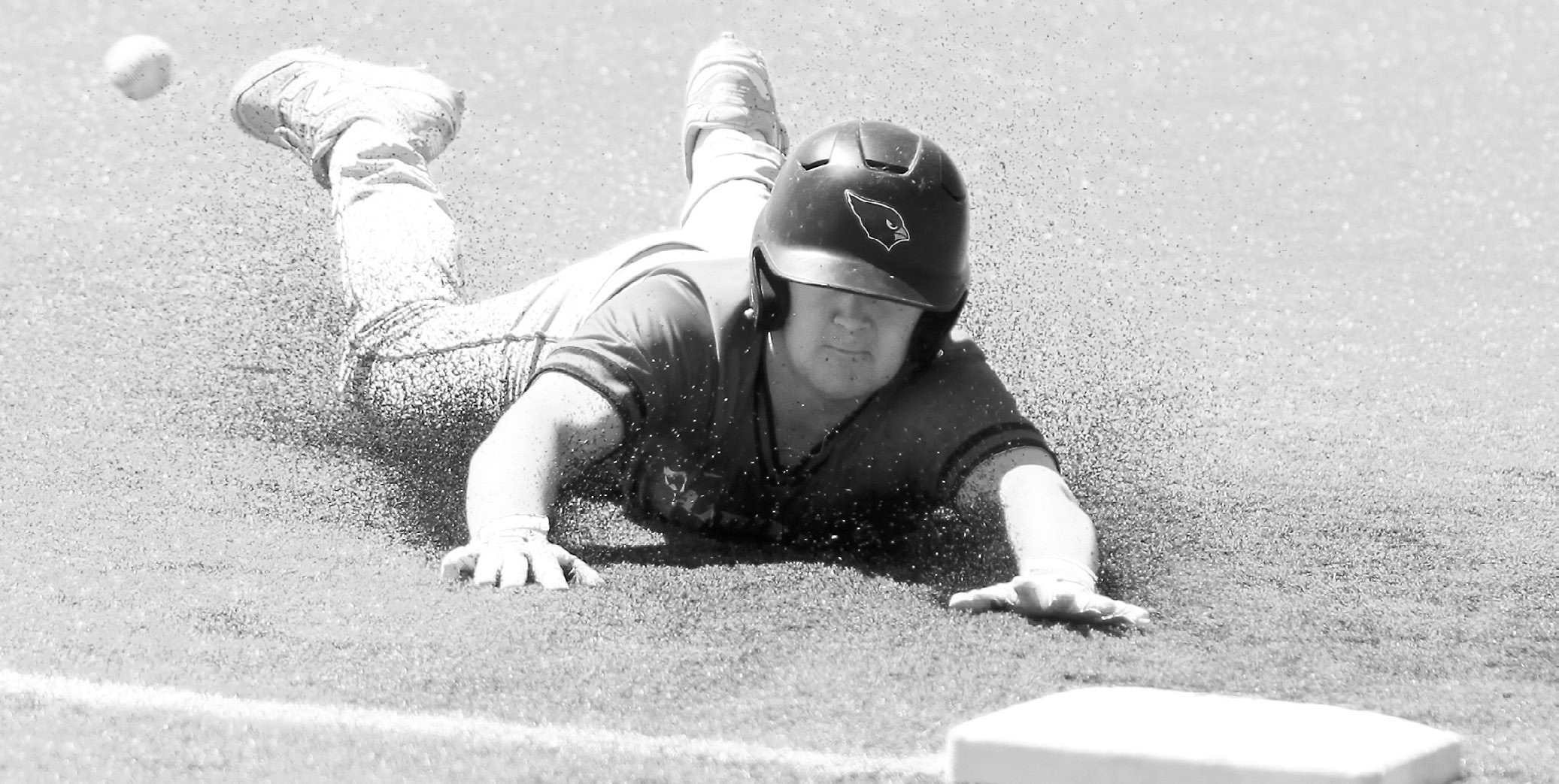 Devin Hakanson gets to the base beating the ball. Photo by Chelsea Wysocki/The Walsh County Record.