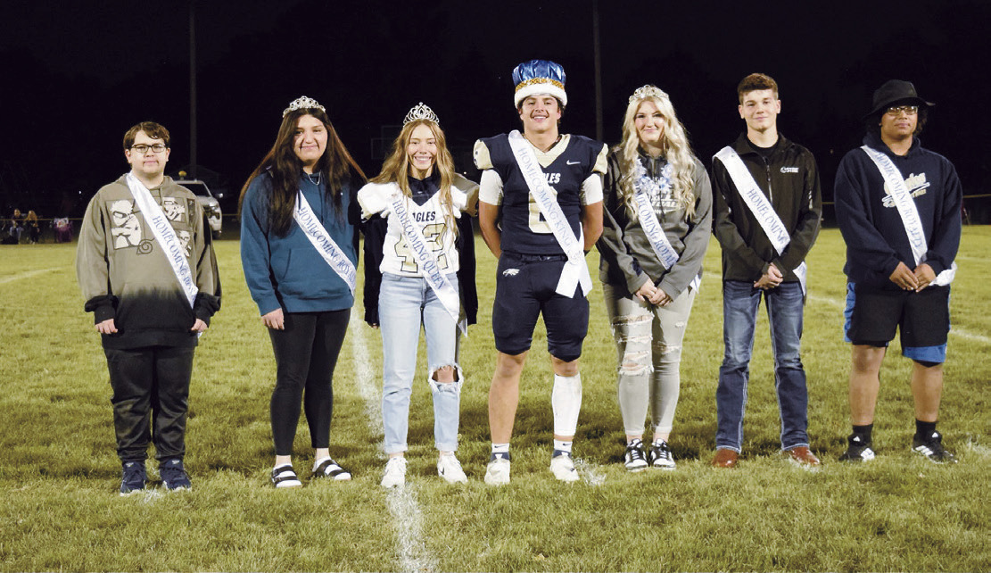North Border Pembina’s Homecoming Court (L-R) Ethan Lawler, Lucia Kancel, Victoria Crotty (Homecoming Queen), Grant Cosley (Homecoming King), Jenna Lyons, Kolin Warner, and Azaar Briscoe. Photo by Ashely Schafer.