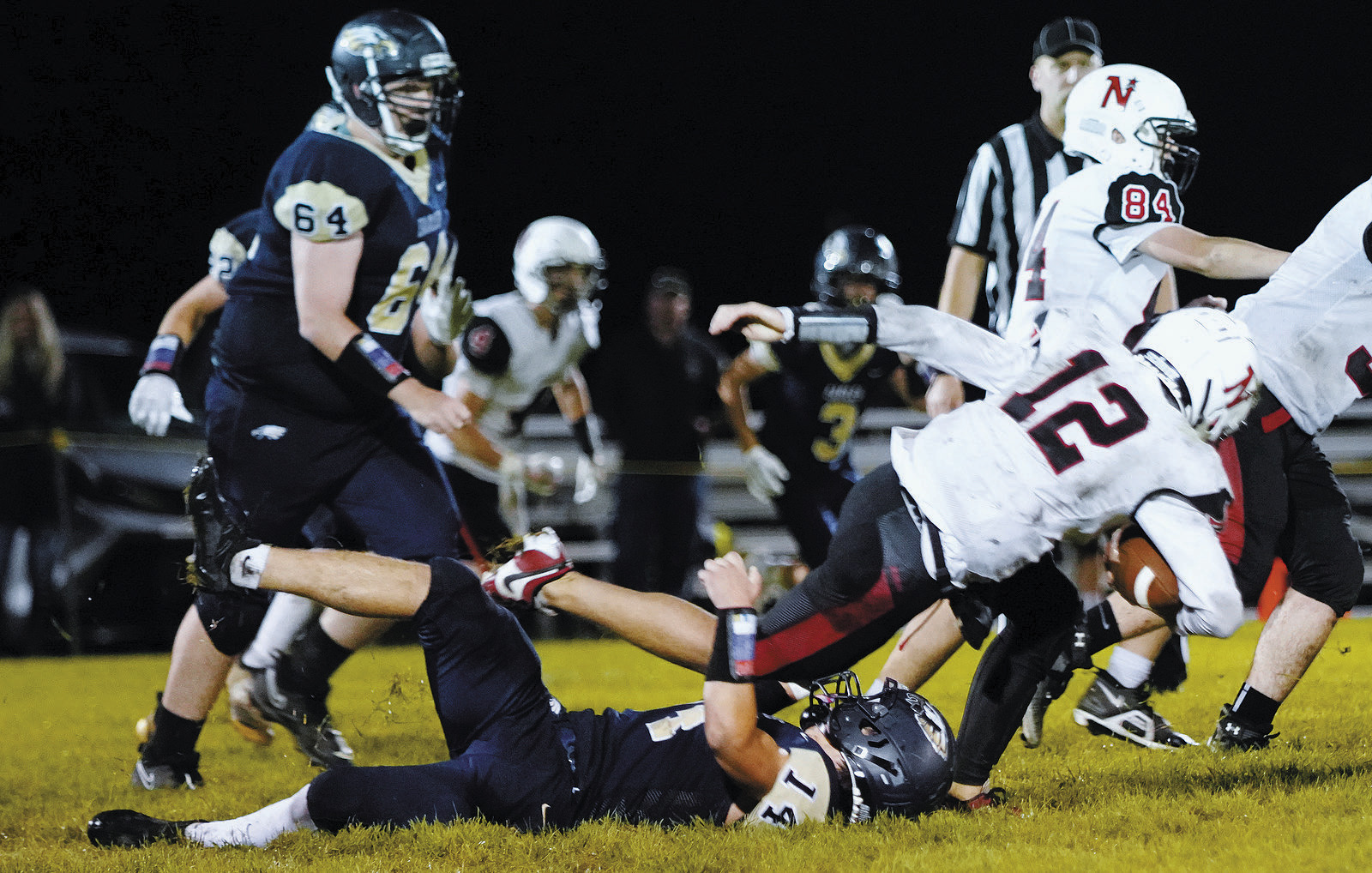 Colton Baily gets his hands on Bearcats QB Hunter Hagler in the Eagles win over the Bearcats. Photo by Larry Stokke.